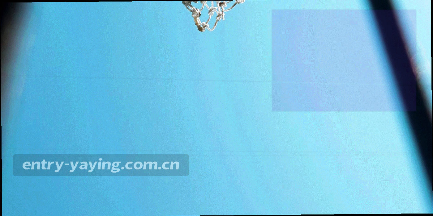 场馆入口通道的广角视角，尽头透出场内灯光